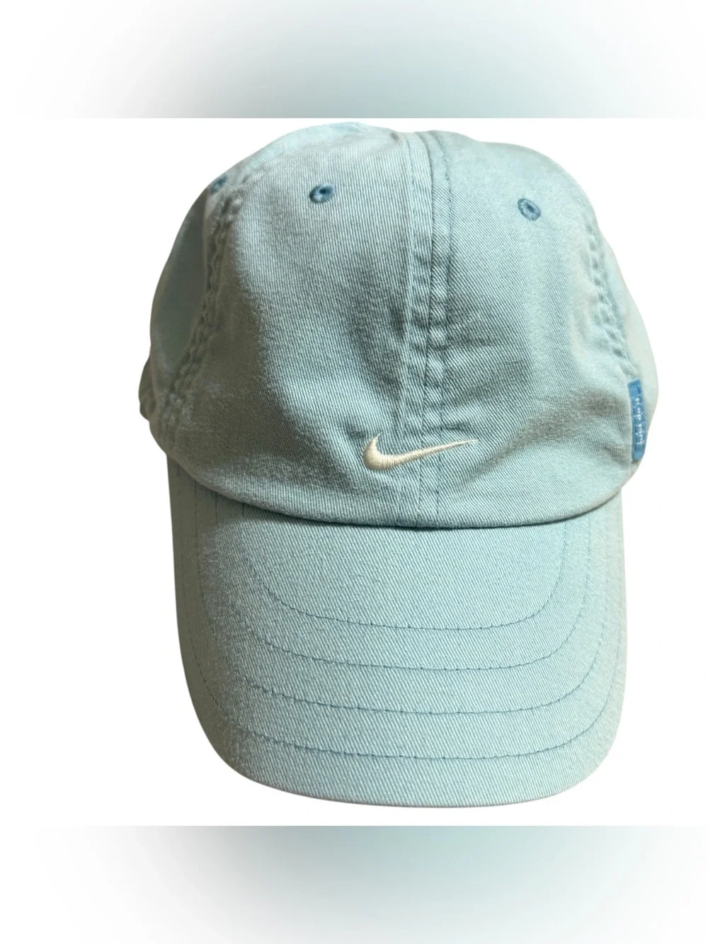 Nike Light Blue a cap With Embroidered White Swoop